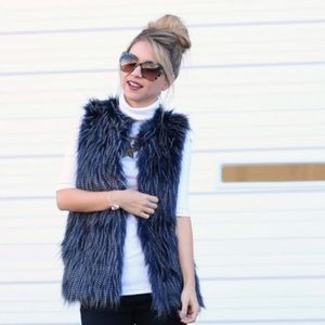 Skies are blue navy fur vest